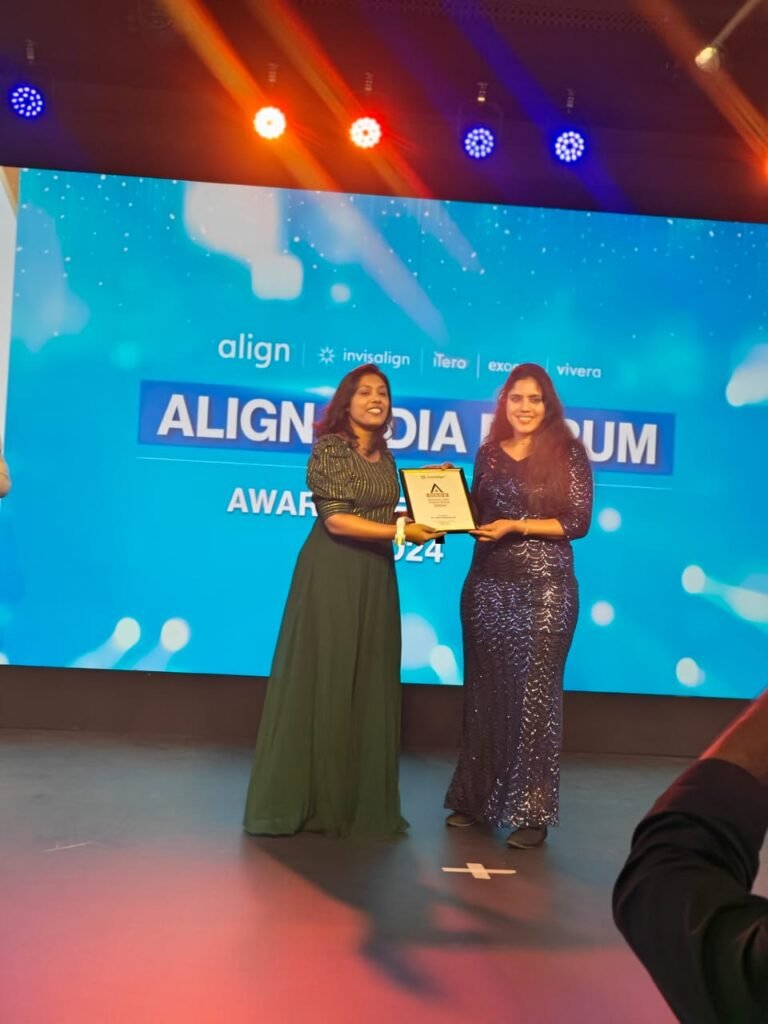 Invisalign platinum provider award for Dr anjuna madakkuni